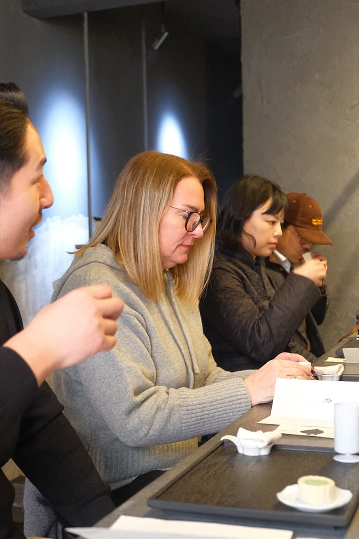 Guests tasting Chinese tea in the tea space.